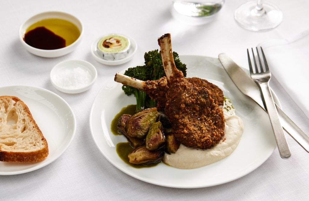 Qantas New Menu March 2023 - Crumbed Margra lamb cutlets with broccolini, brussels sprouts and lemon myrtle celeriac puree (First)